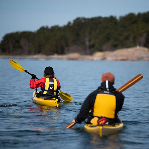 Two persons kayaking in the archipelago sea