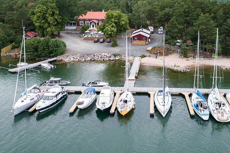 Drone view of Rumar Strannd terrace and harbour in the summer