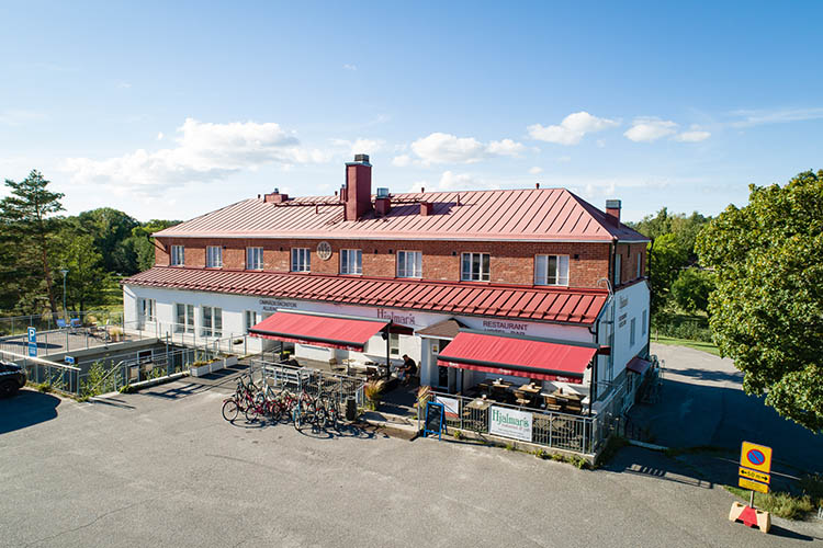 Exterior drone view of Hjalmars restaurant and pub